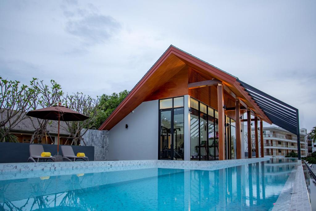 Accommodation pool and pavilion at dusk