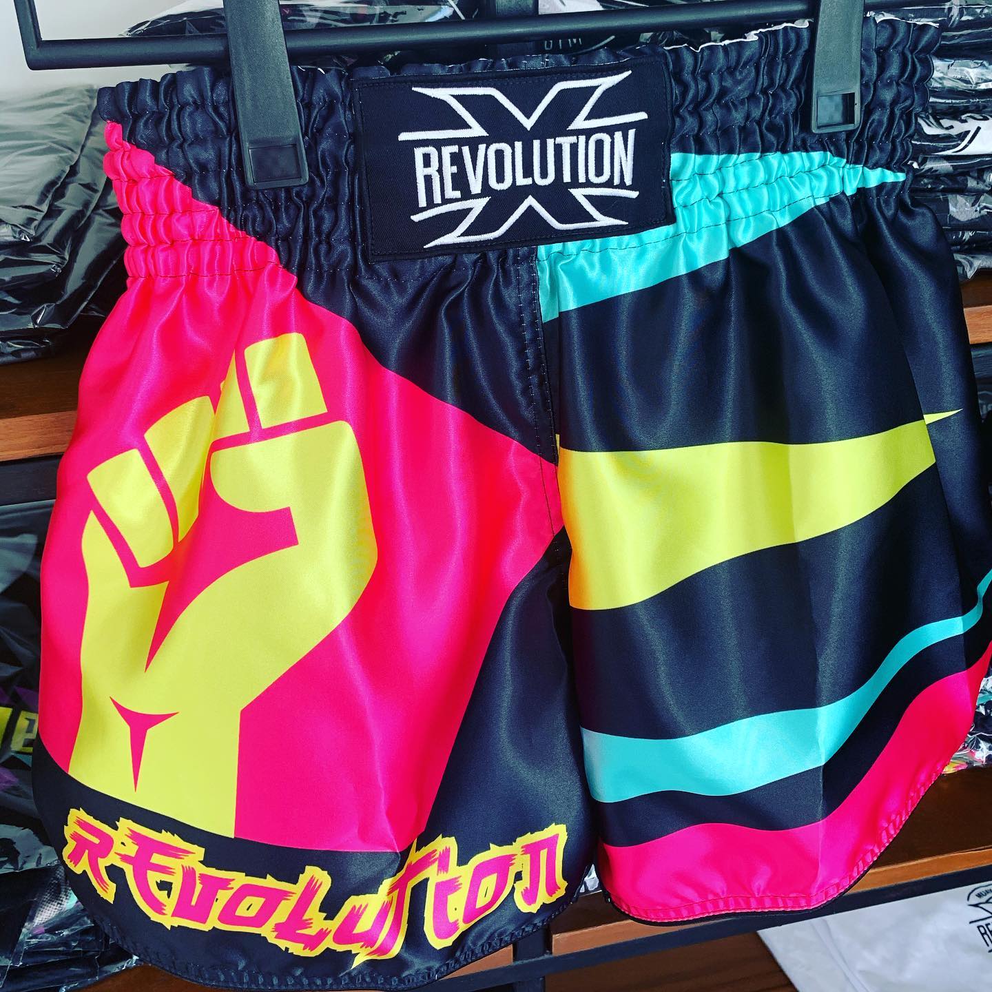Revolution X Muay Thai Shorts Fist Pink Yellow