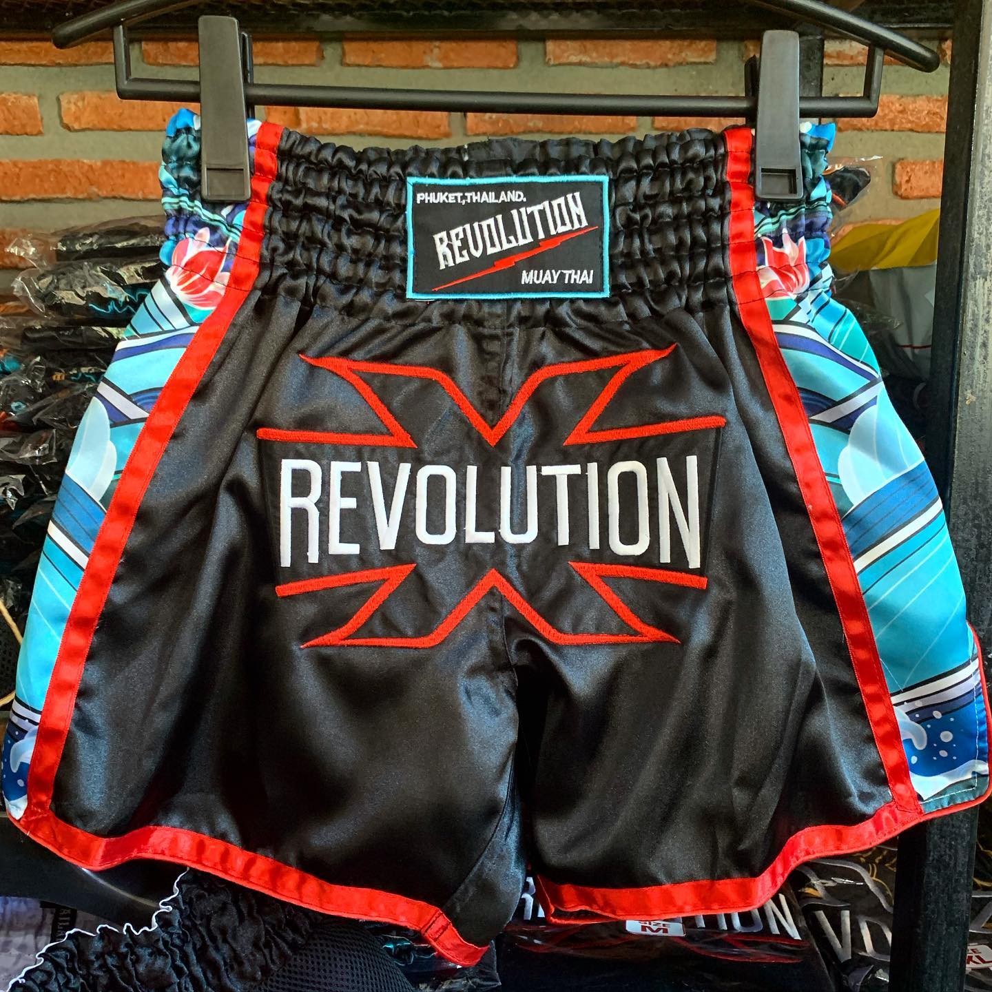Revolution X Muay Thai Shorts Black Red Teal Wave